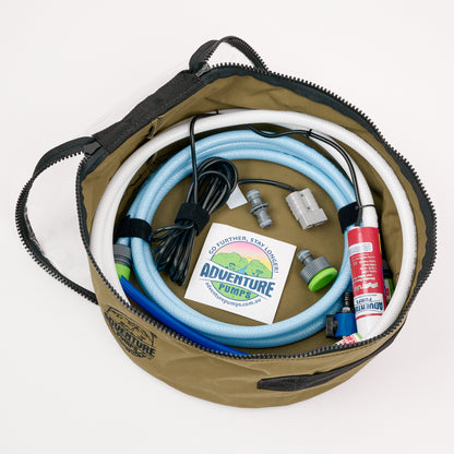 Adventure Pumps Universal Bundle containing hoses, connectors, and a pump on a white background